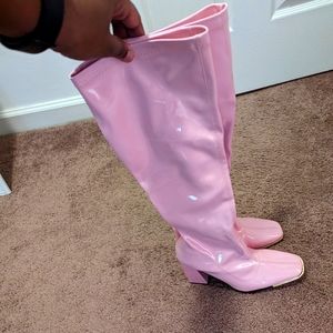 Knee high pink boots